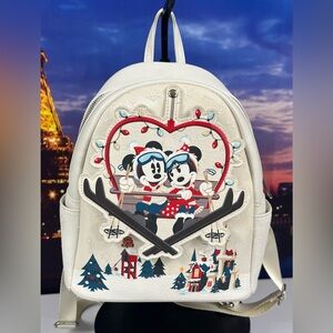 Loungefly Disney Parks Ski Lodge mini backpack.